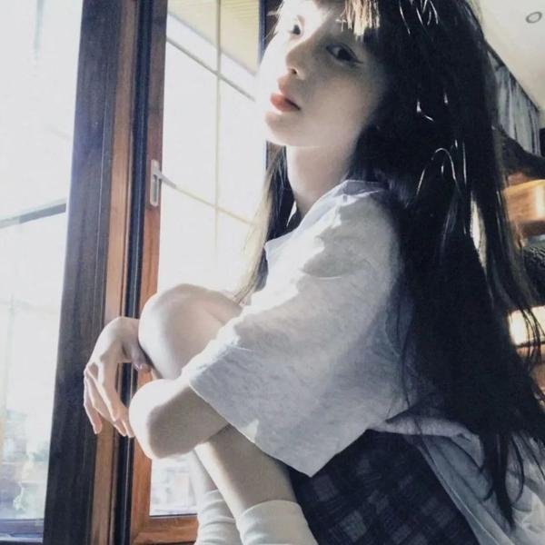 彼女